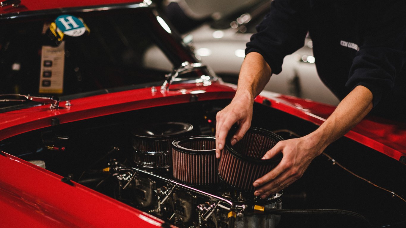 Technician fitting a quality air filter